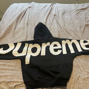 Supreme Black Hoodie with White Tag Logo